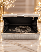 Bolso clutch plata brillo