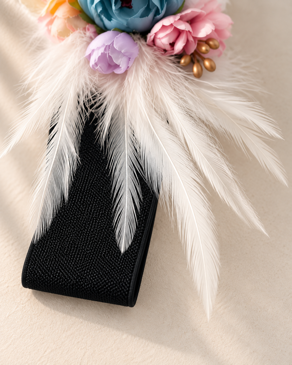 Cinturón elástico negro plumas