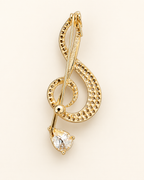 Broche clave Sol dorado